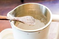 a carafe full of nut milk from the alfabot 