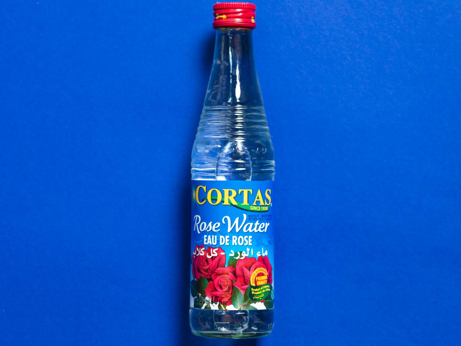 A bottle of rose water.