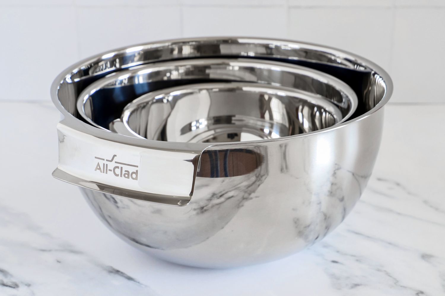 Set of nested stainless steel All-Clad mixing bowls