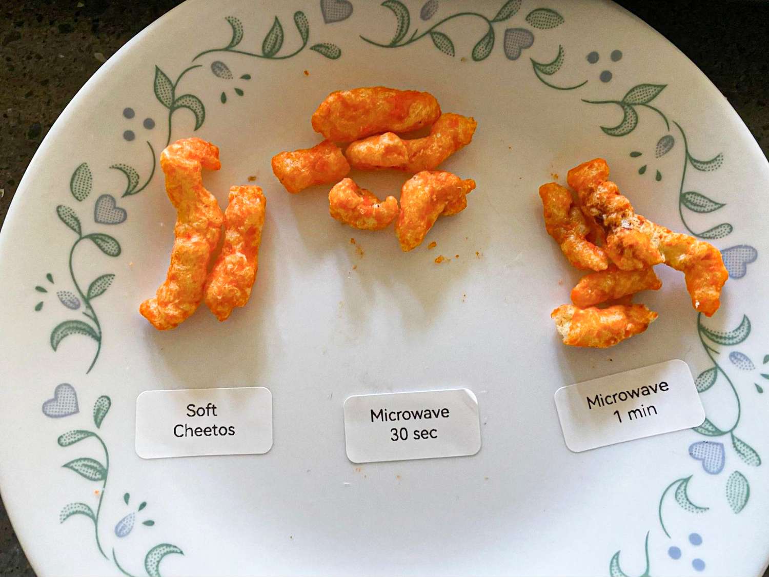 A plate of Cheetos labeled Soft Cheetos, Microwave (30 seconds), Microwave (1 Min)