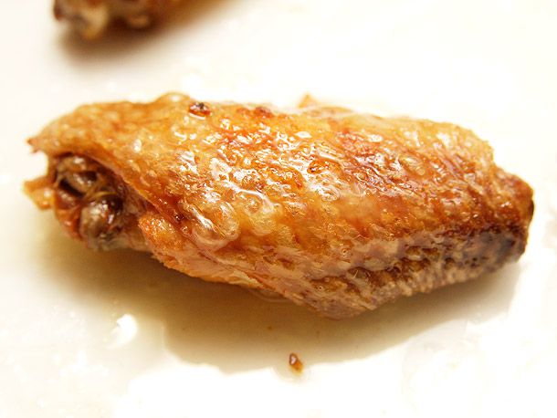 Closeup of a fried chicken wing.