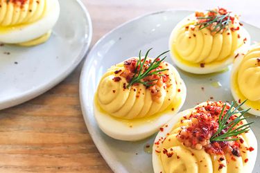 Closeup of mustardy deviled eggs.