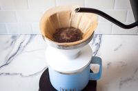 A kettle pouring water over the Yeti Rambler Pour-Over
