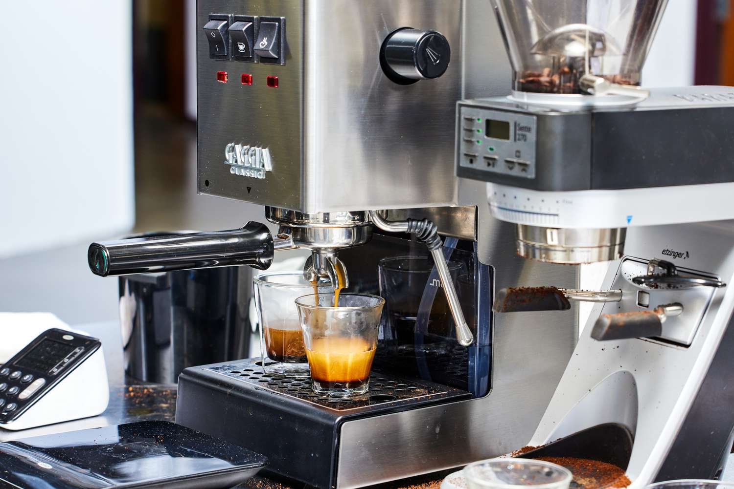 Two espresso cups being filled by the Gaggia Classic Pro Espresso Machine