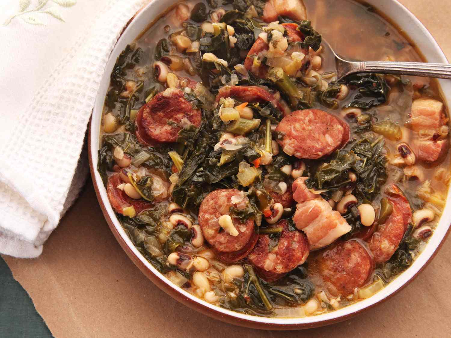 Overhead shot of a serving bowl filled with the black-eyed pea stew.