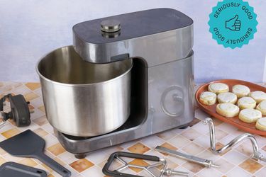 the ooni stand mixer with its attachments and a plate of cookies