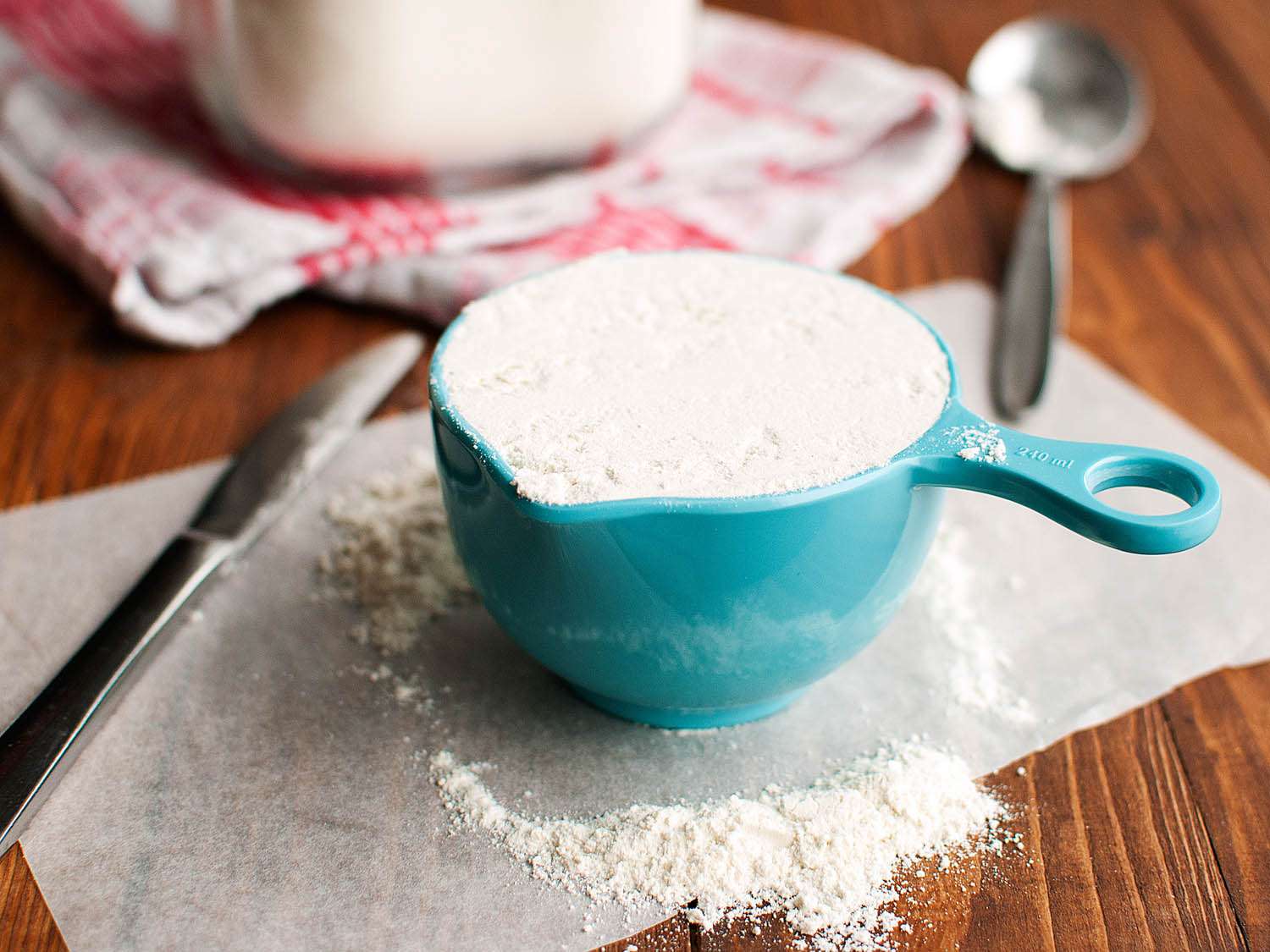 Closeup of a properly measured cup of flour.