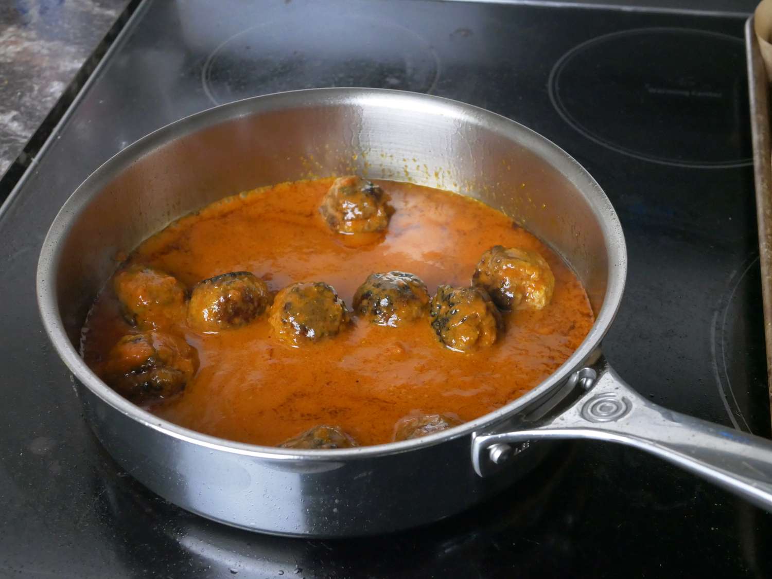 meatballs in sauce in a pan
