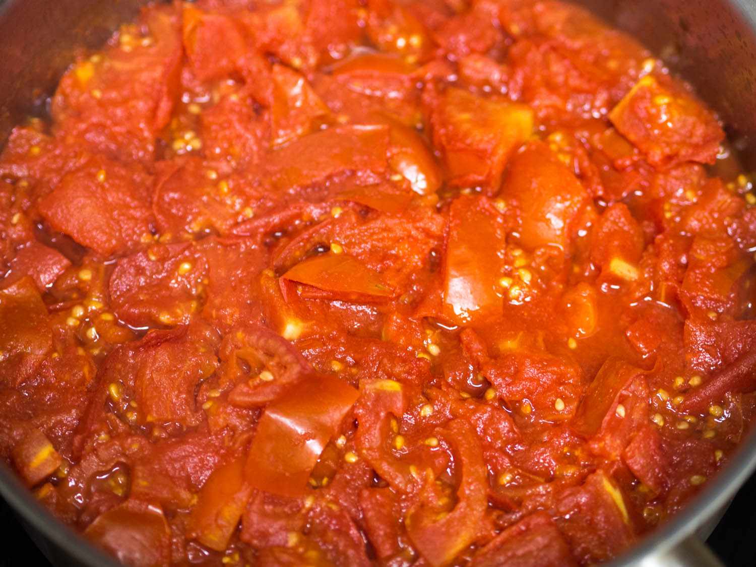 A pot of chopped up Amish paste tomatoes.