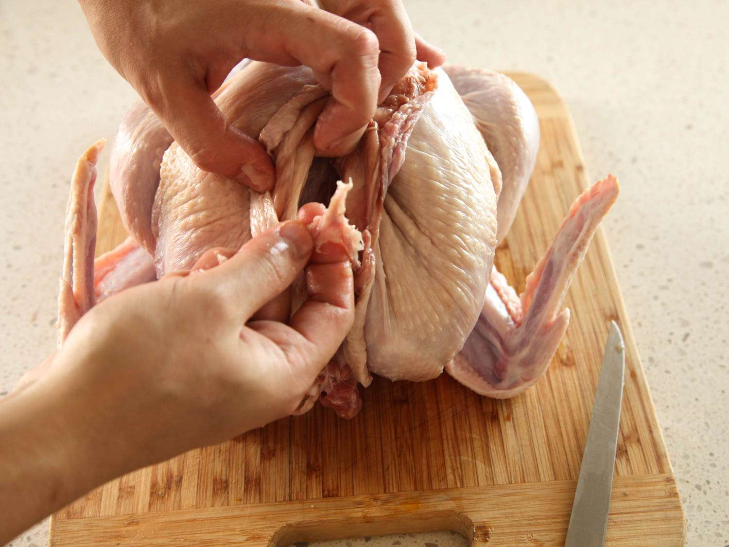removing the wishbone from a raw turkey