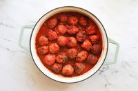 A pot of meatballs in tomato sauce