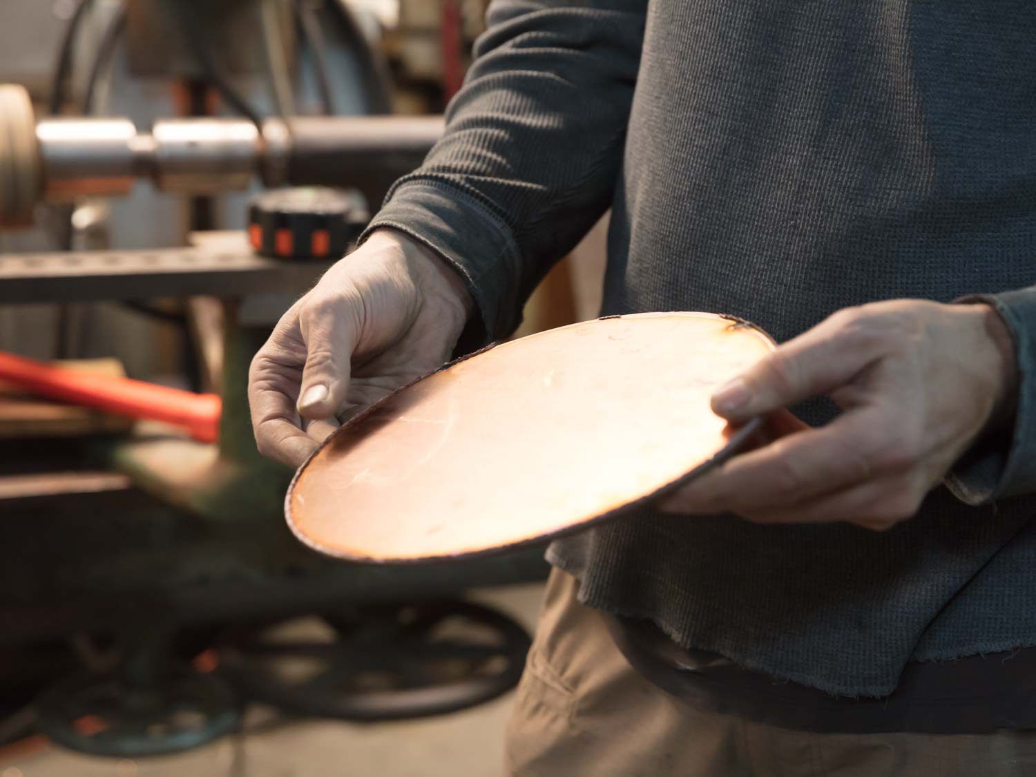 A blank disc of copper ready to be spun into a pan.