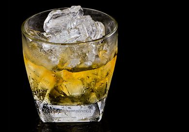 A glass of Irish whiskey on the rocks. 