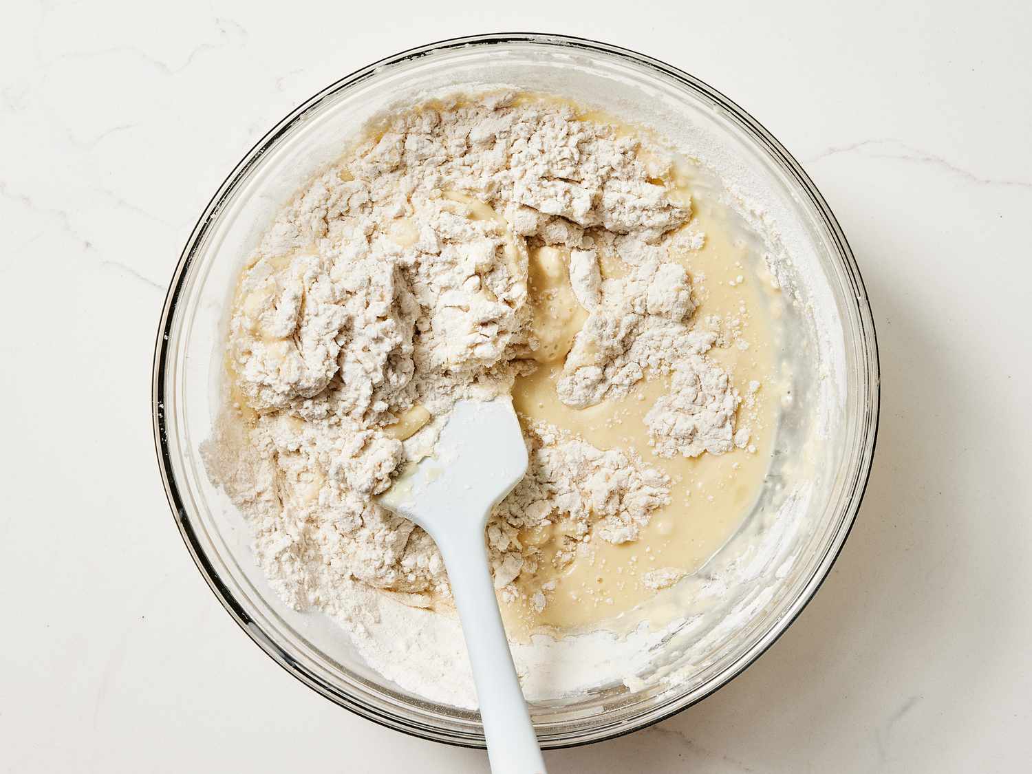 folding together flour and egg mixture 