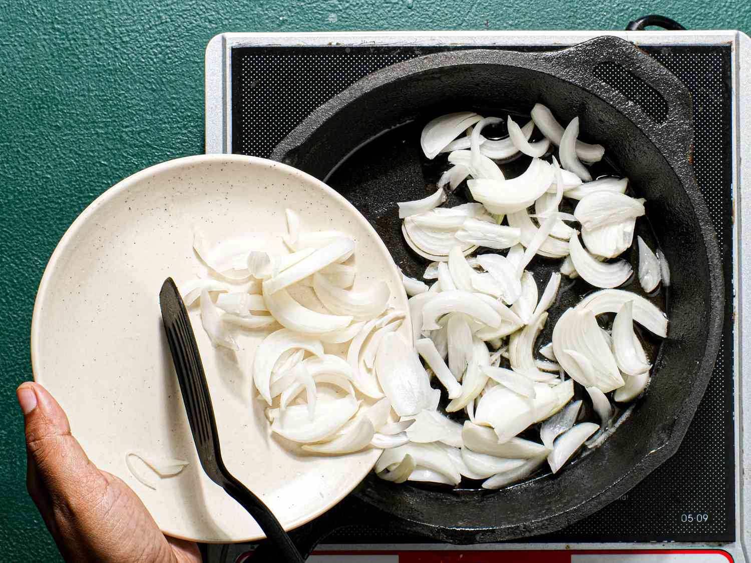 Overhead view of cooking onions