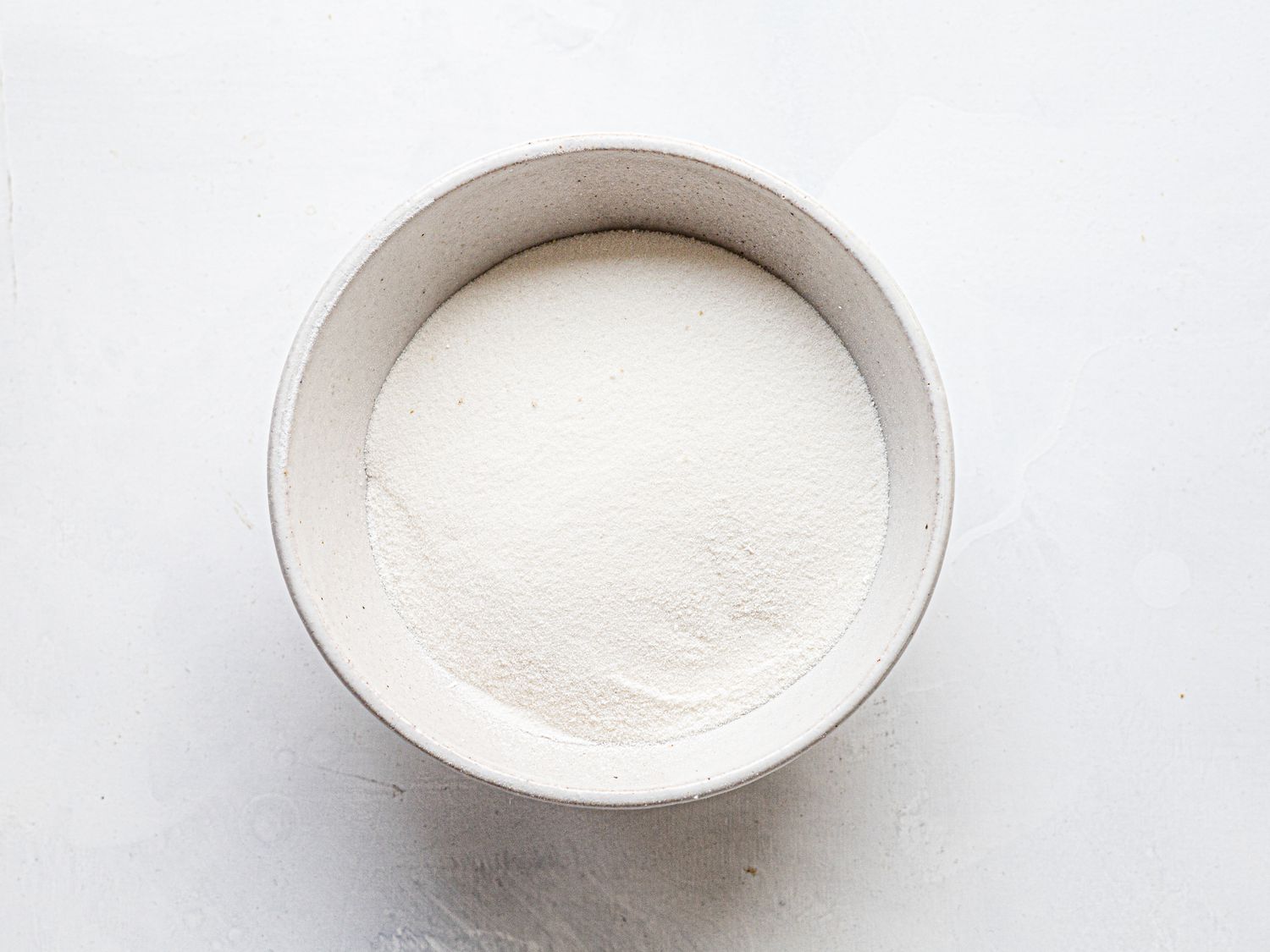 Overhead view of toasted sugar in a bowl