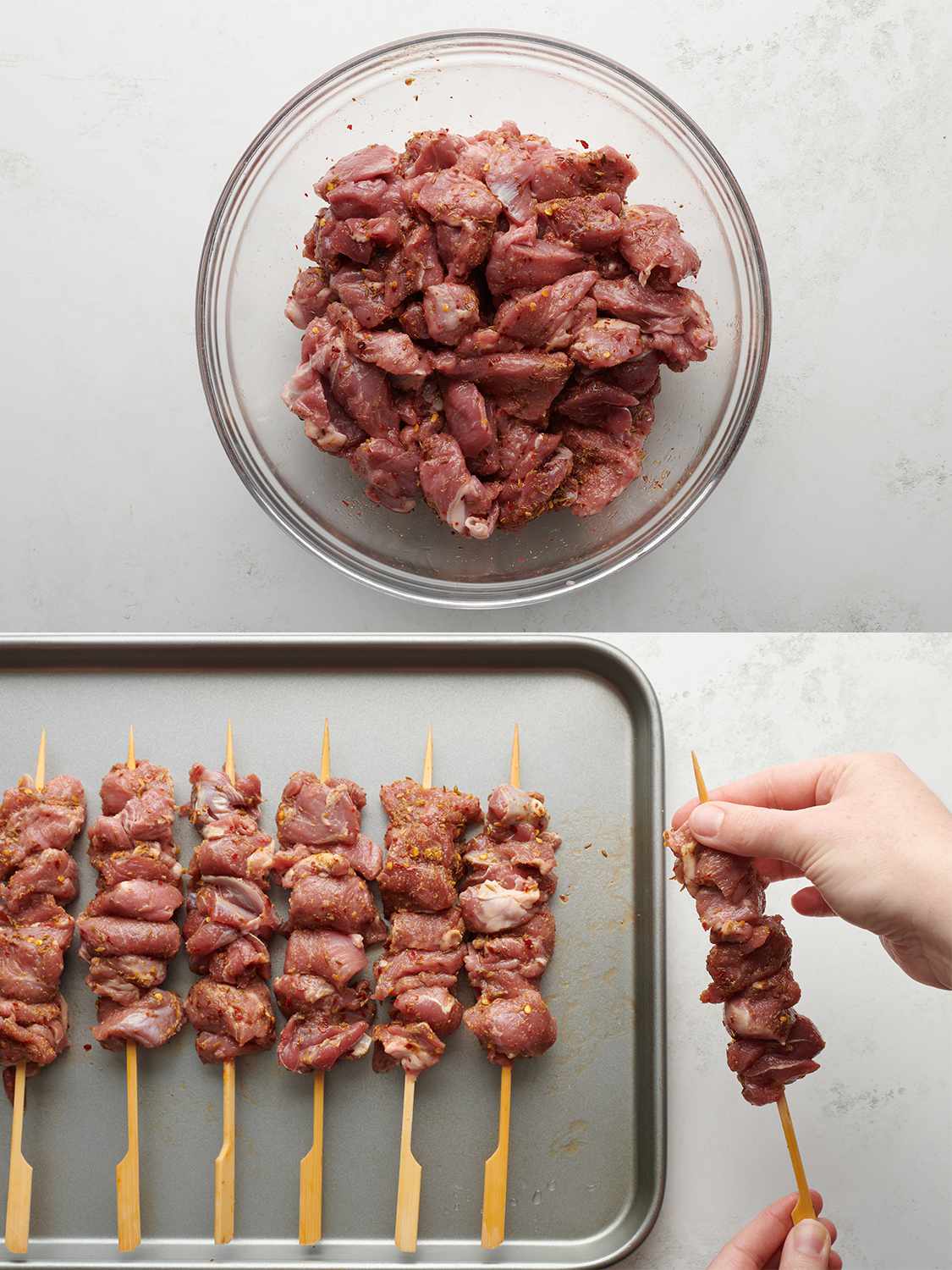 A two-image collage. The top image shows a glass bowl containing the meat which has been tossed with seasoning. The bottom image shows the meat being threaded onto wooden skewers, which are then placed on a rimmed baking sheet.