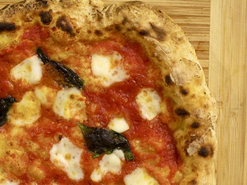 Overhead, closeup shot of Neopolitan-style pizza