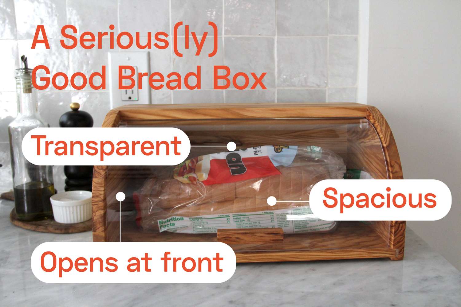 A wooden bread box with a sliced loaf of sandwich bread in it.