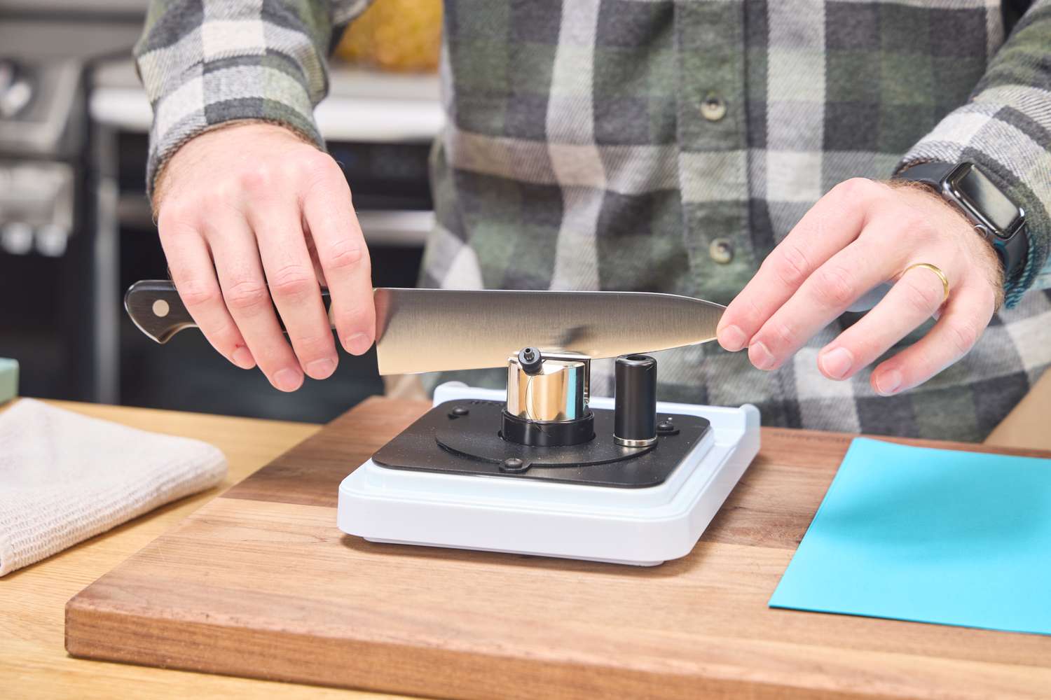 A person sharpens the Misono UX10 Chef’s Knife No. 712