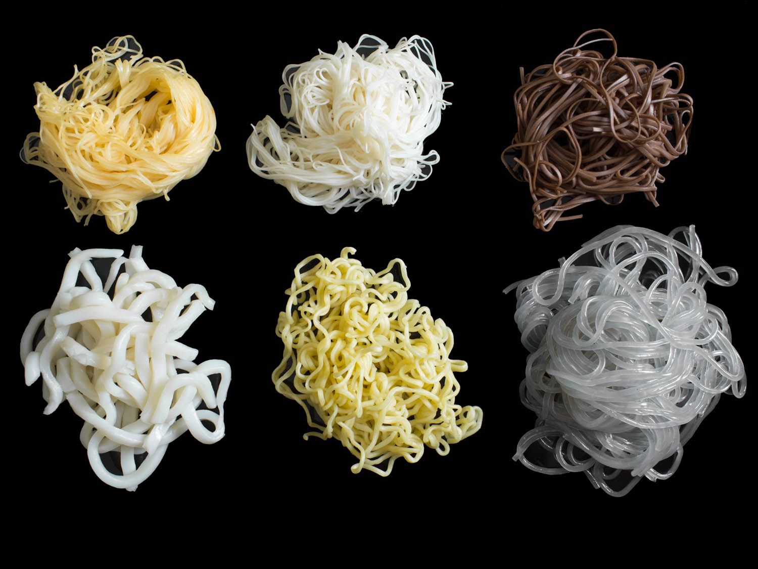 Six different Asian noodle types on a black background.