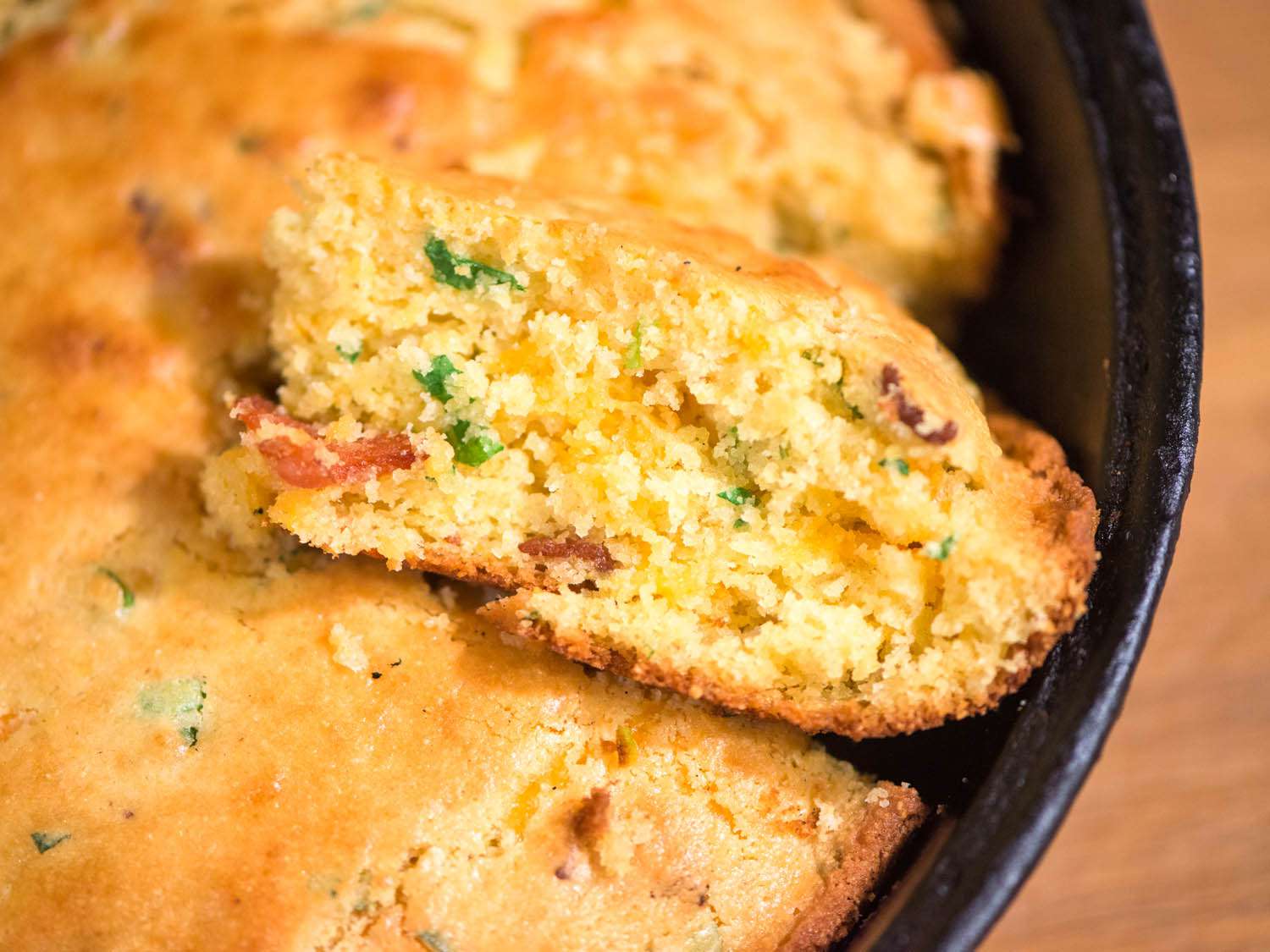 Cross-section view of cheddar, bacon, and scallion cornbread.