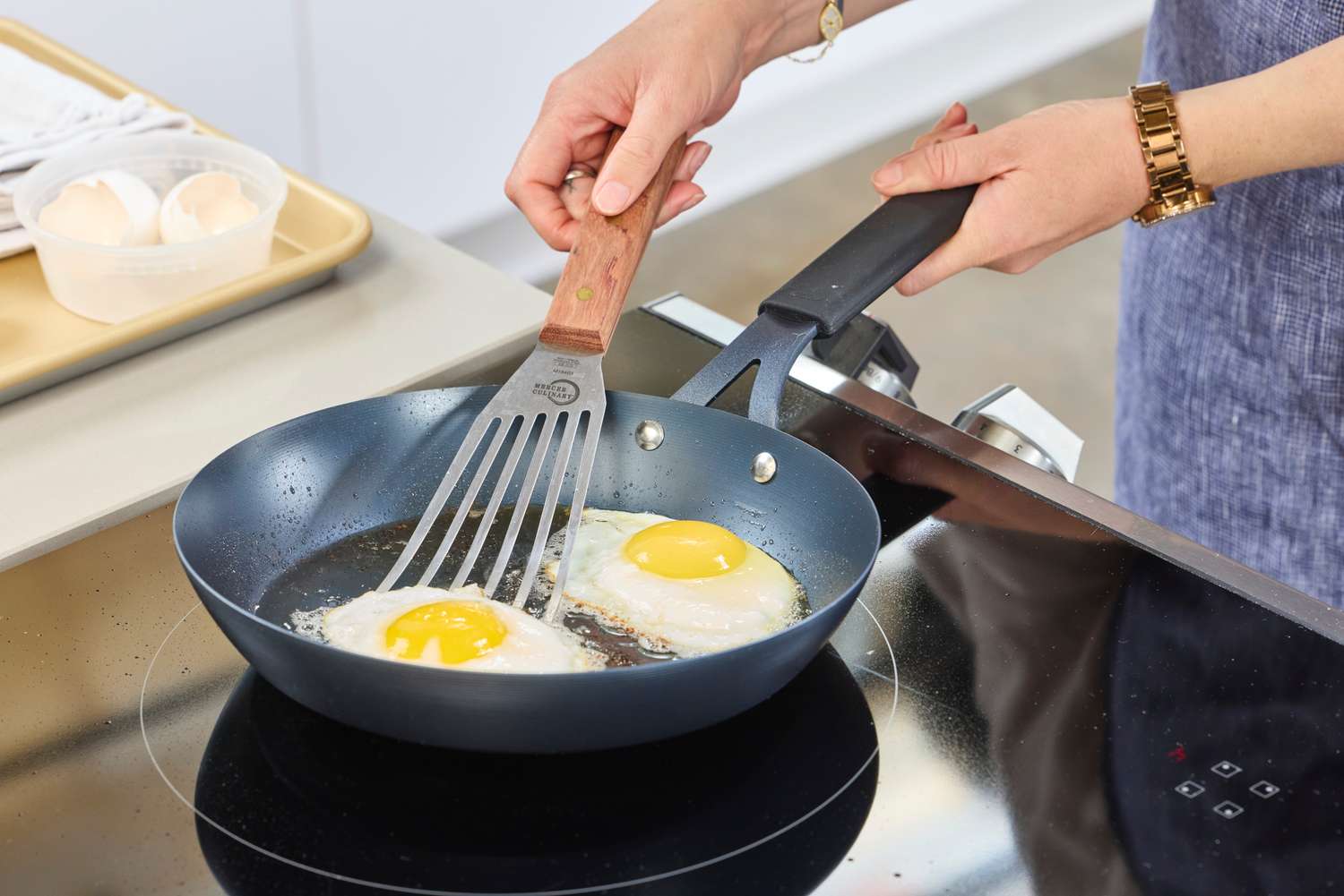 Eggs are cooked in the OXO Obsidian 10 Inch Pre-Seasoned Carbon Steel Frying Pan
