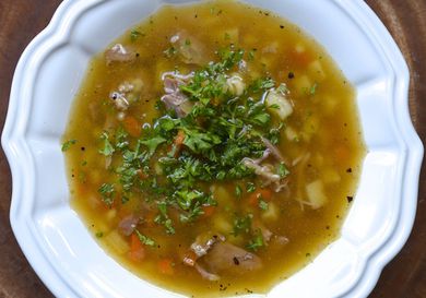 OVerhead view of a bowl of scotch broth.
