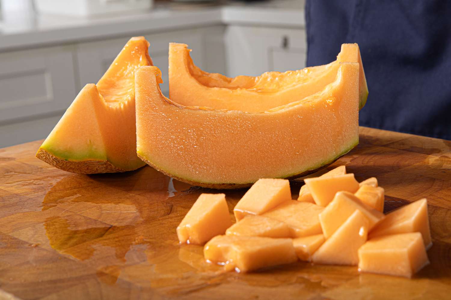 Side angle view of how to cut a cantalope 