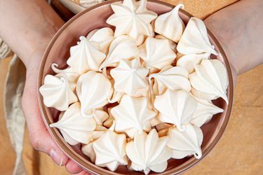 Meringue cookies in a bowl.