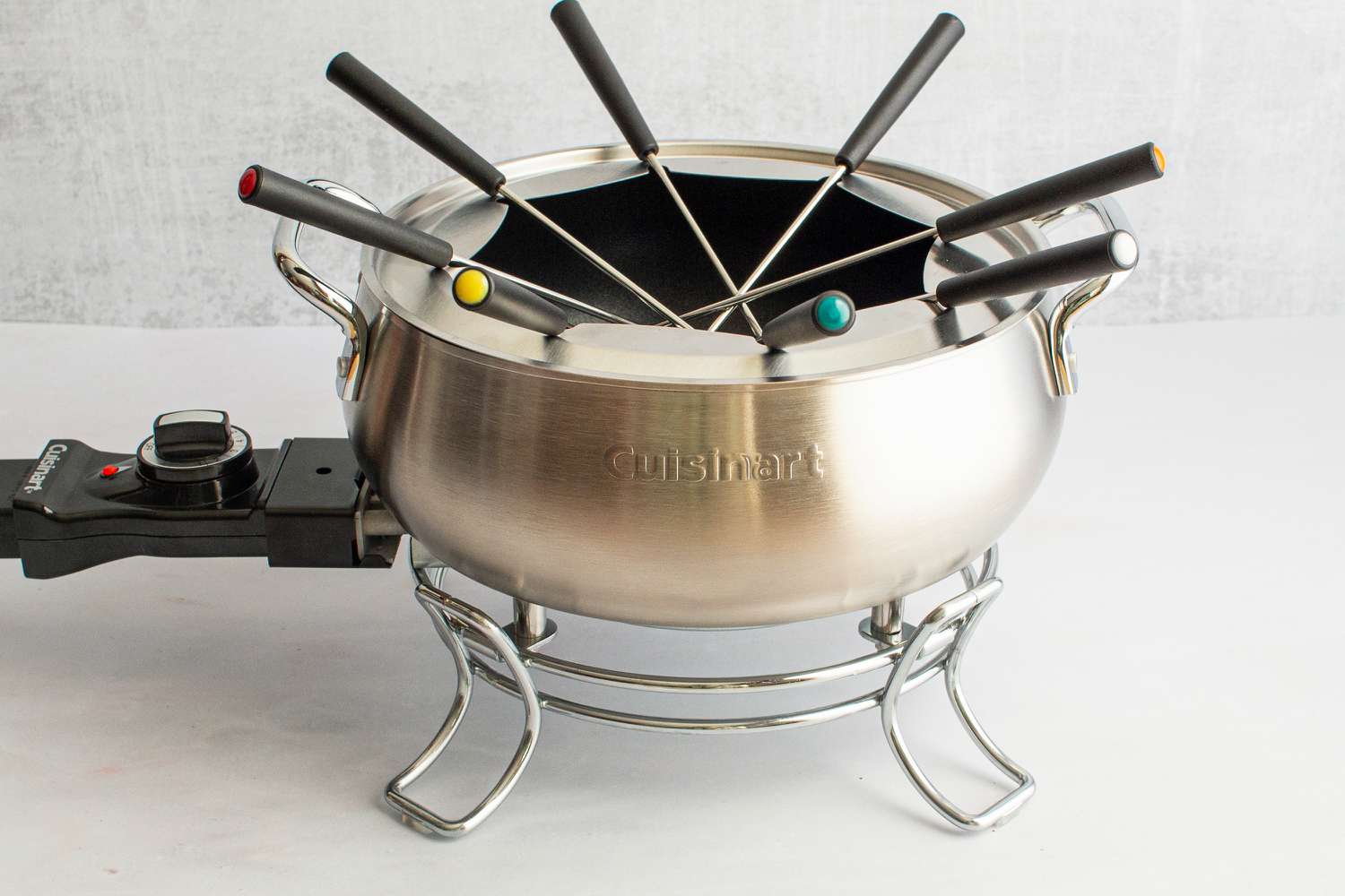 The Cuisinart fondue pot on grey countertop.