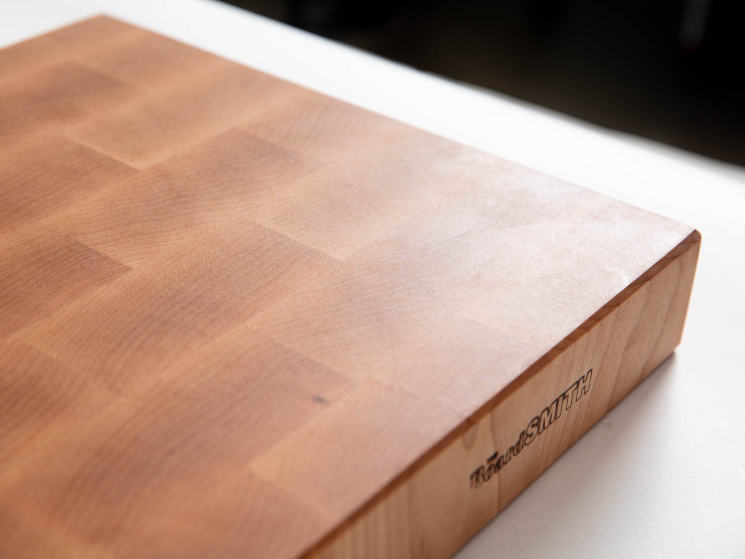 A closeup of The Boardsmith's end-grain maple cutting board.
