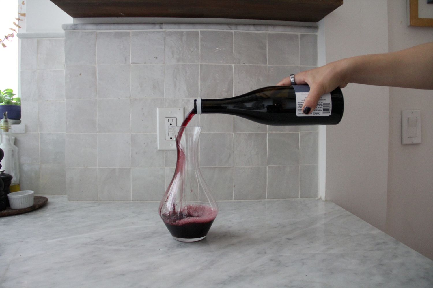 Red wine being poured into the Riedel Cabernet wine decanter