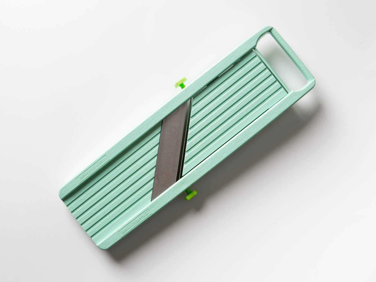 Overhead view of a Benriner mandoline slicer.