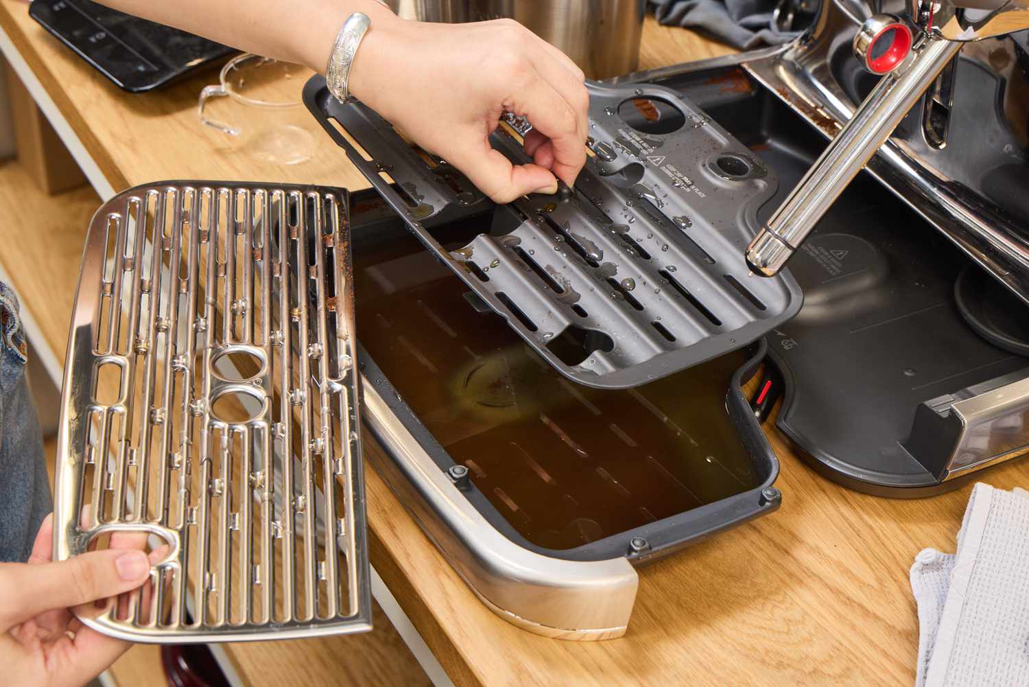 A person assembles the Breville The Oracle Jet Espresso Machine