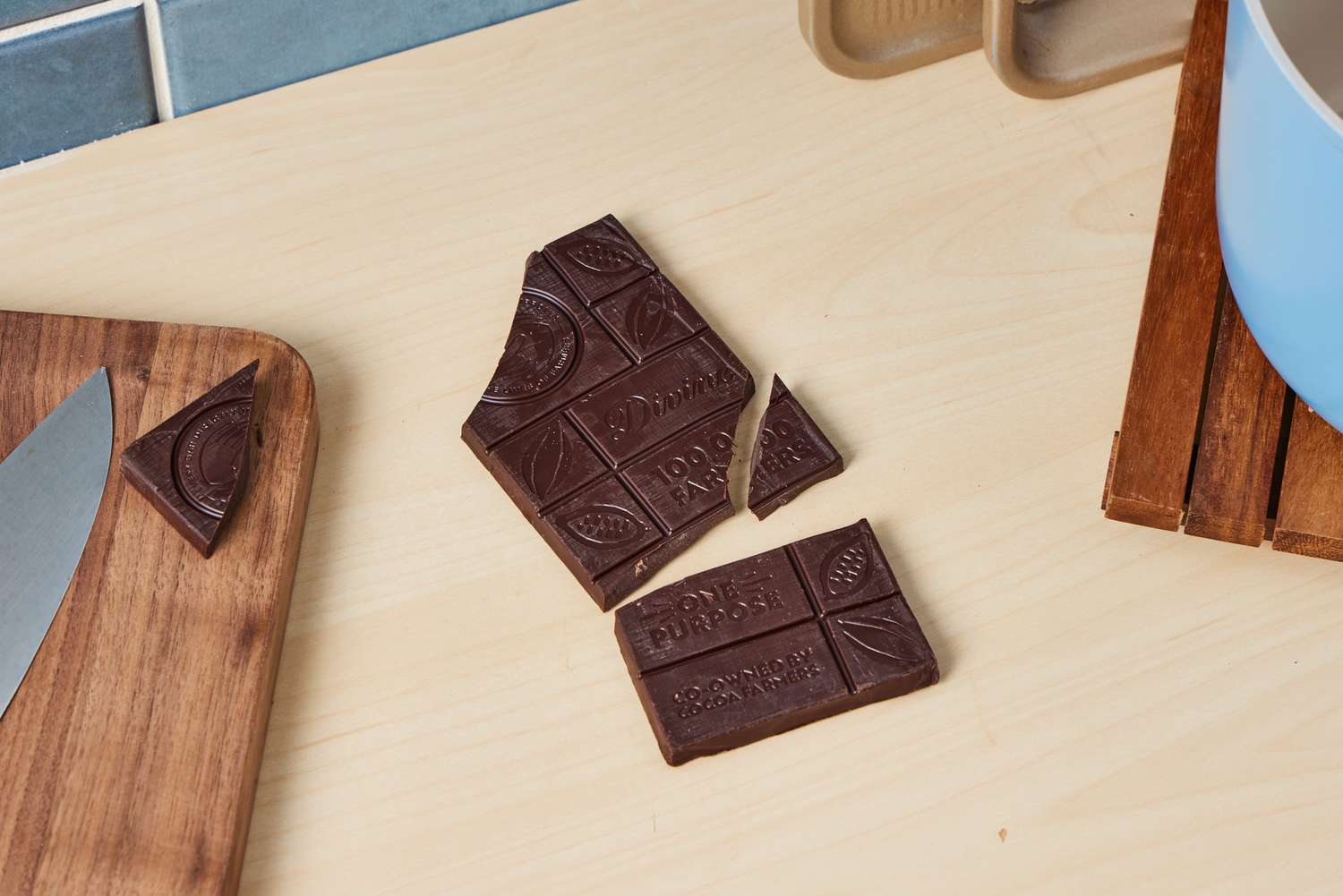 An unwrapped Divine extra-dark chocolate bar.