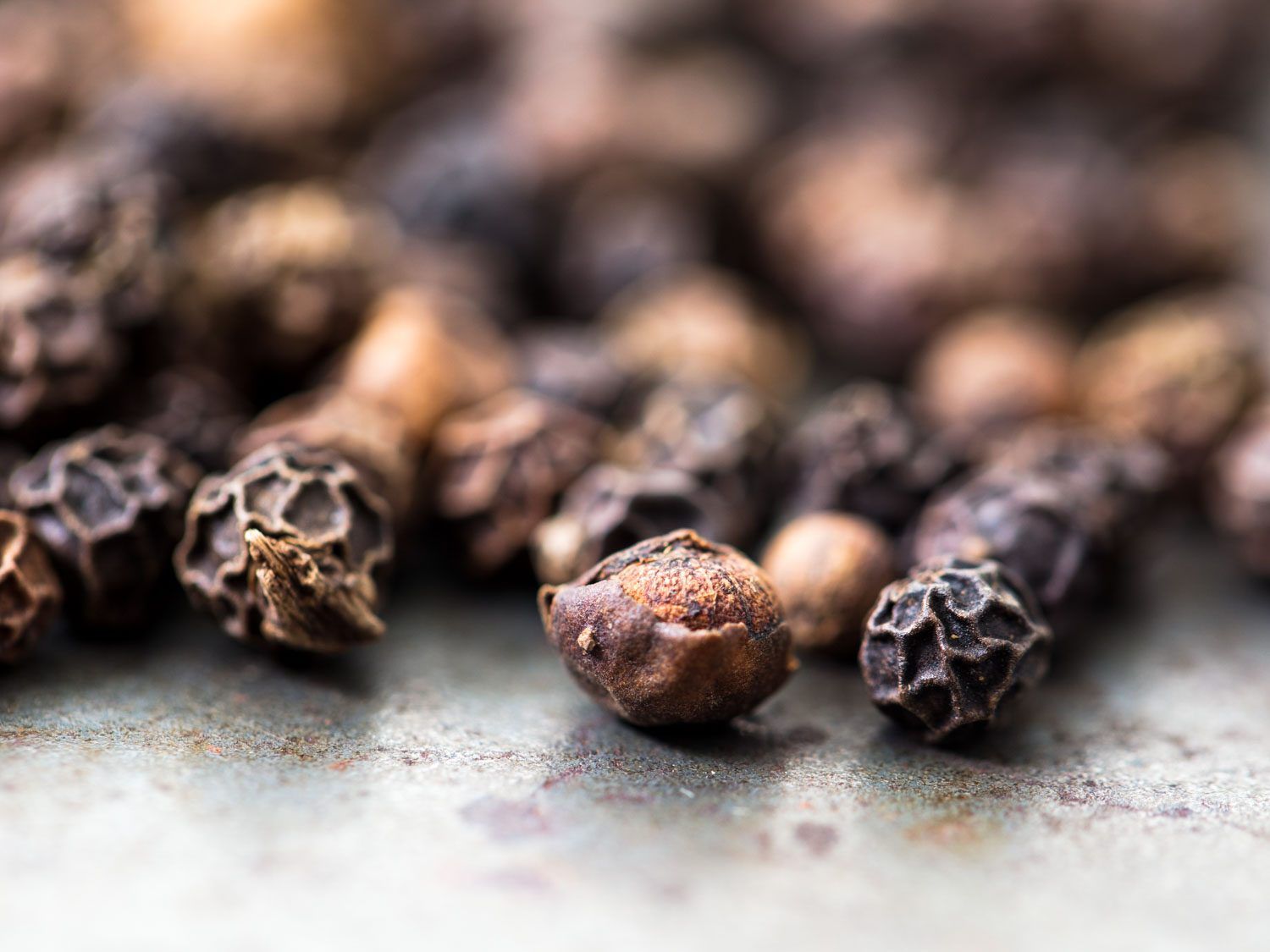 Macro close-up of Tellicherry peppercorns