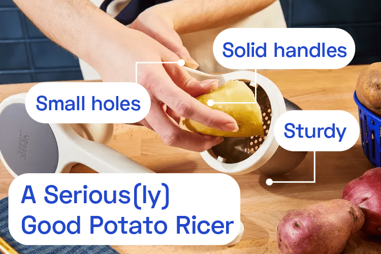 A cooked potato is inserted into a potato ricer.