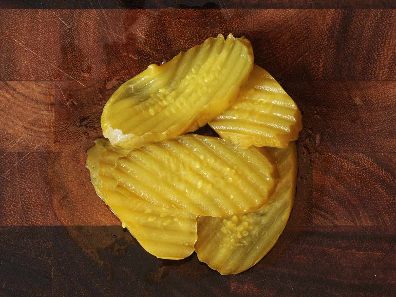 Oval-cut pickle chips.