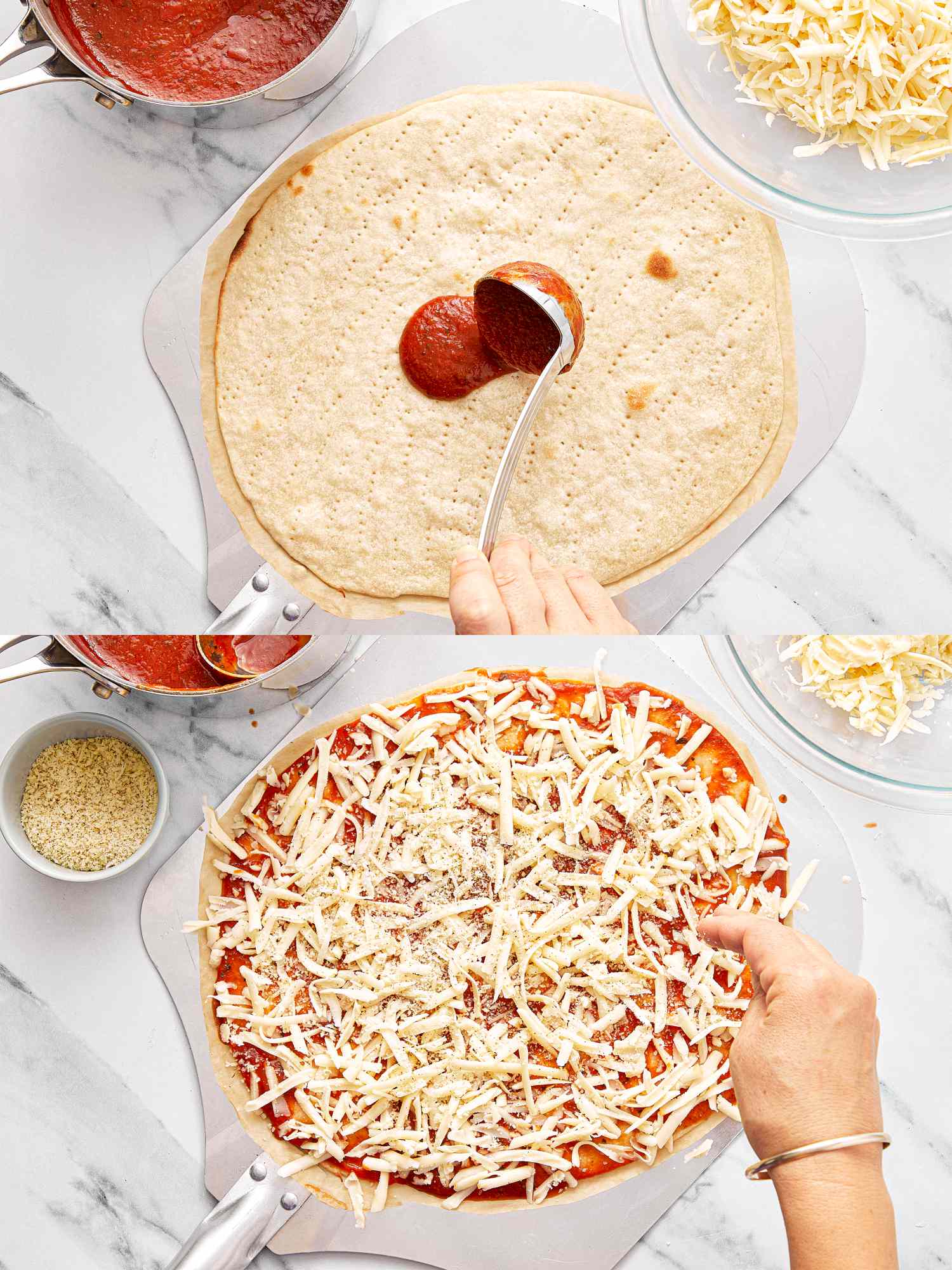 A person spreading sauce onto pizza dough and adding cheese to the pizza