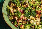 Bowl of broccoli salad with assorted toppings