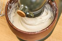 Whipped cream is made in the KitchenAid Design Series Evergreen Stand Mixer