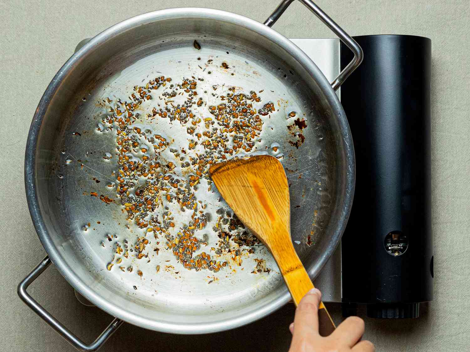 Overhead view of toasting spices