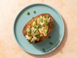 Vegan cheesy baked potatoes with broccoli