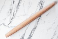 J.K. Adams Maple French Rolling Pin on a marble surface