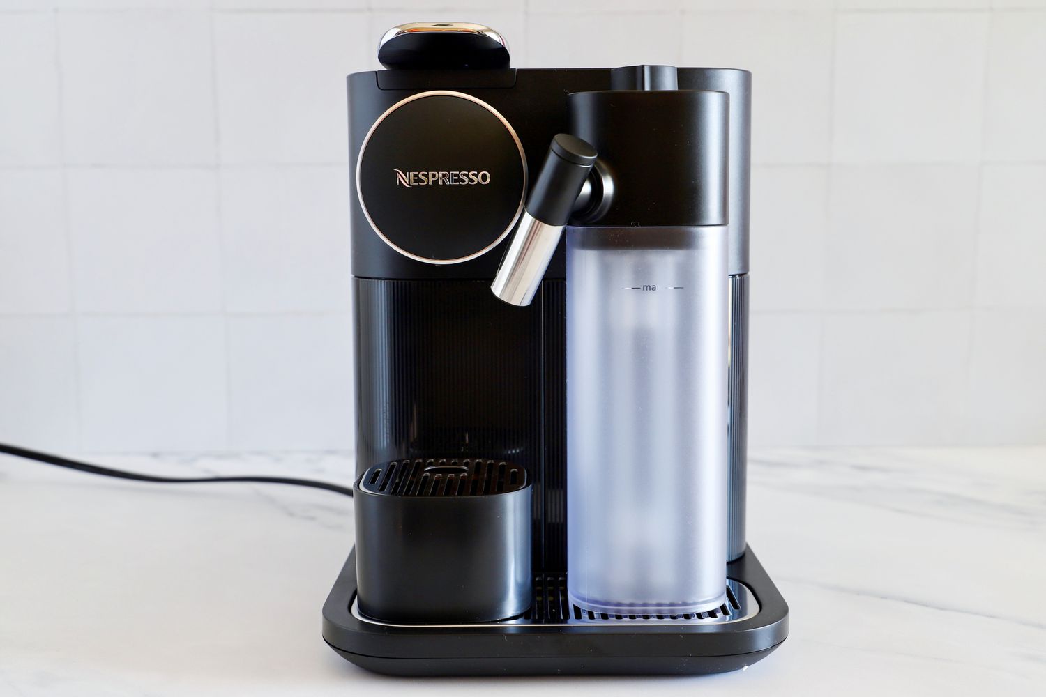 The Nespresso Gran Lattissima Original Espresso Machine by De’Longhi on a kitchen counter