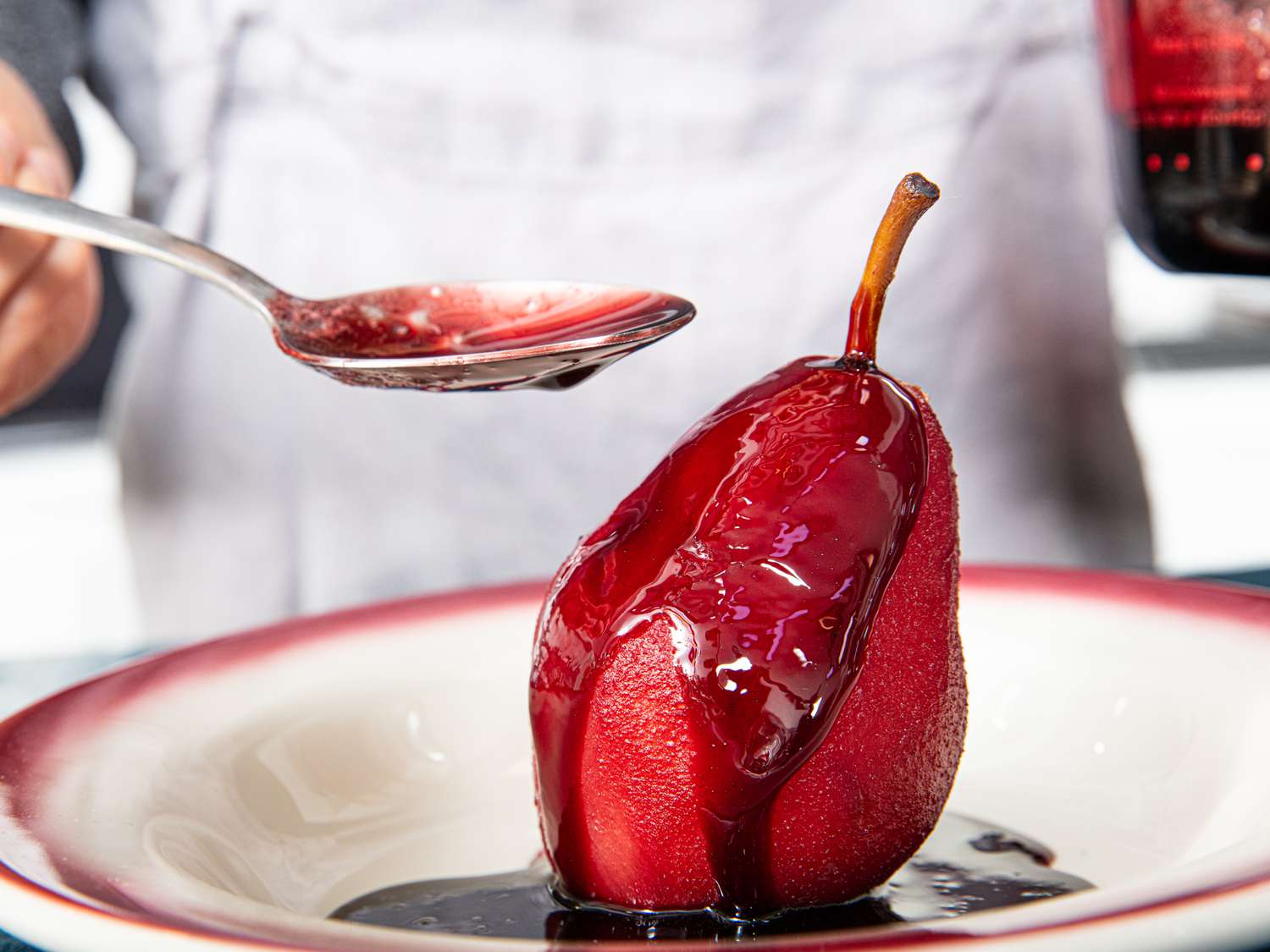Side view of glazed poached pears