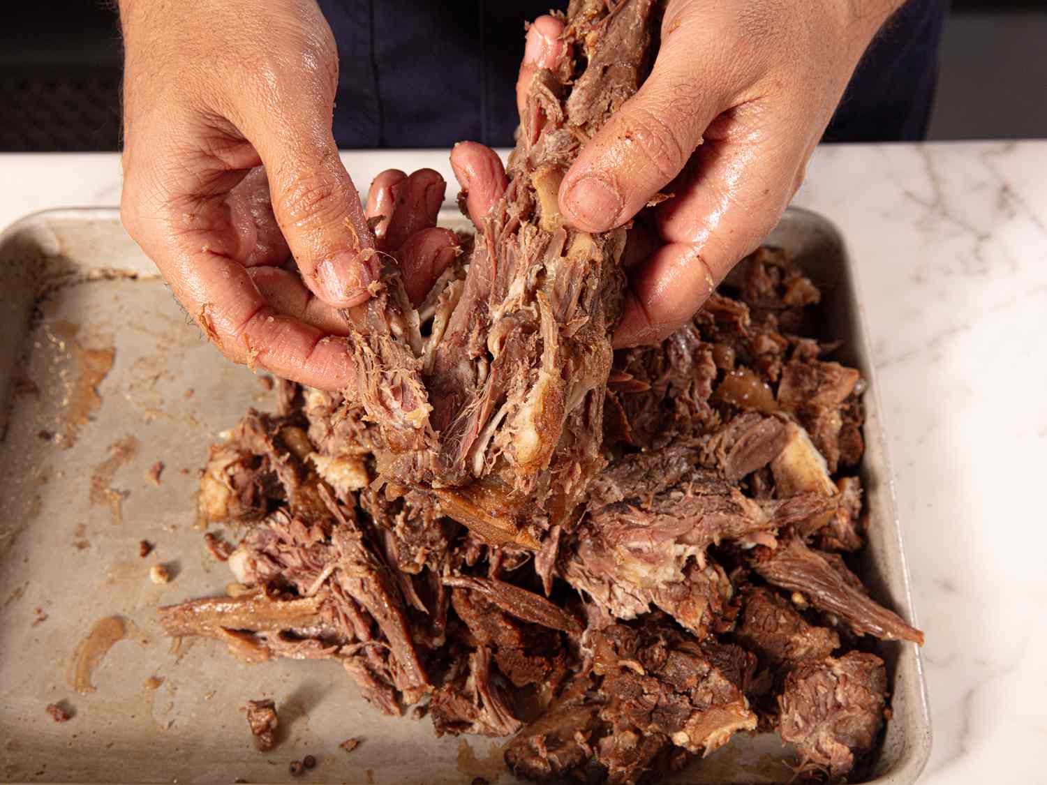 Overhead view of picking meat off the bones