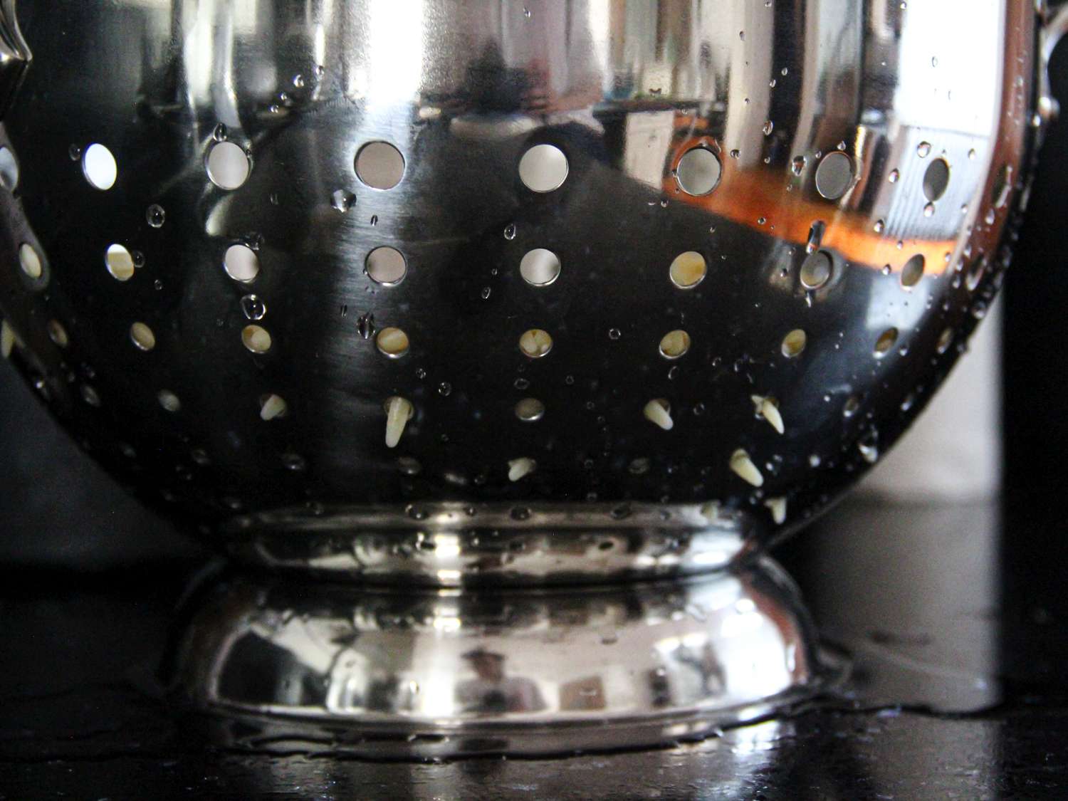 The All-Clad model with orzo poking out of its large holes