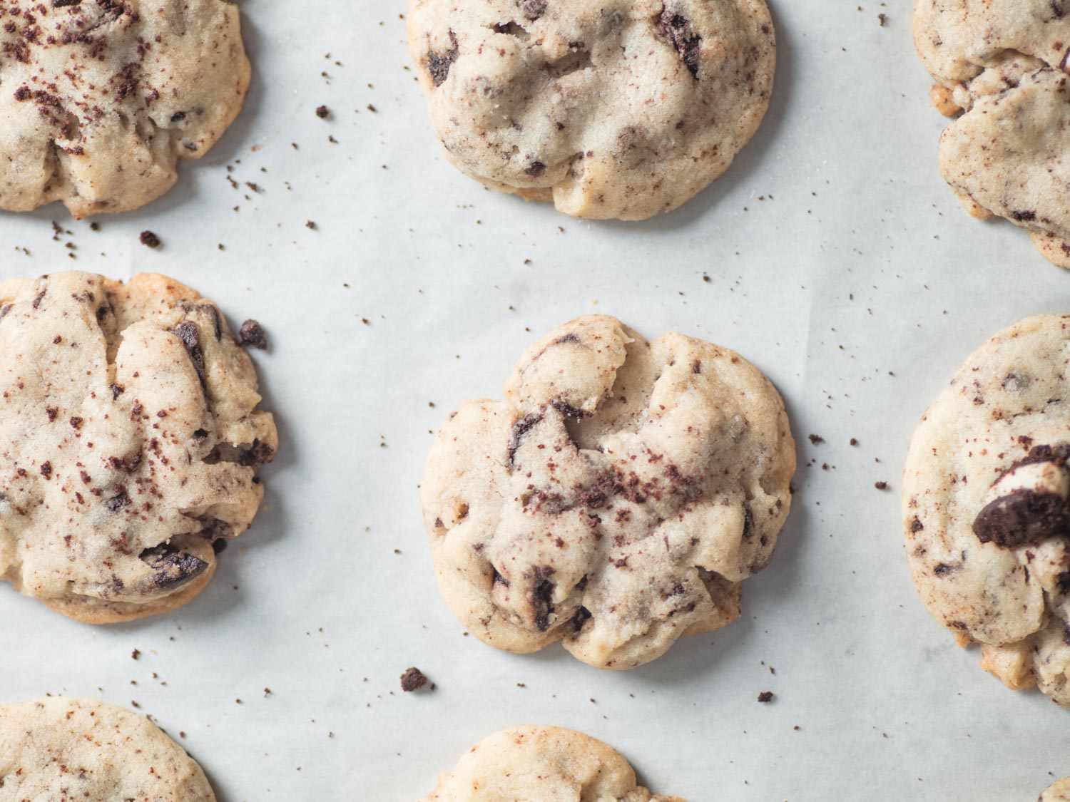 Overhead shot of baked cookies and cream cookies on sheet pan